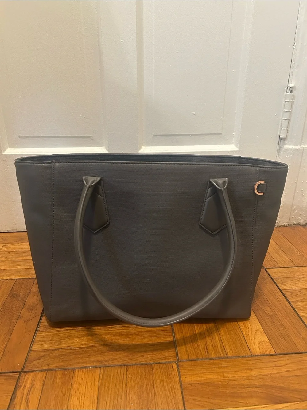 Like-New, Dagne Dover Signature Gray Tote with Gold Accent
